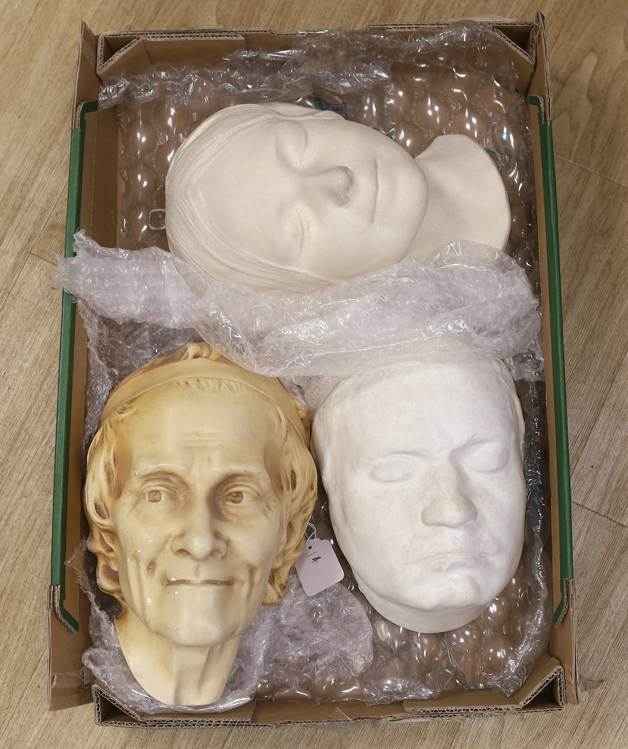 Three plaster death masks